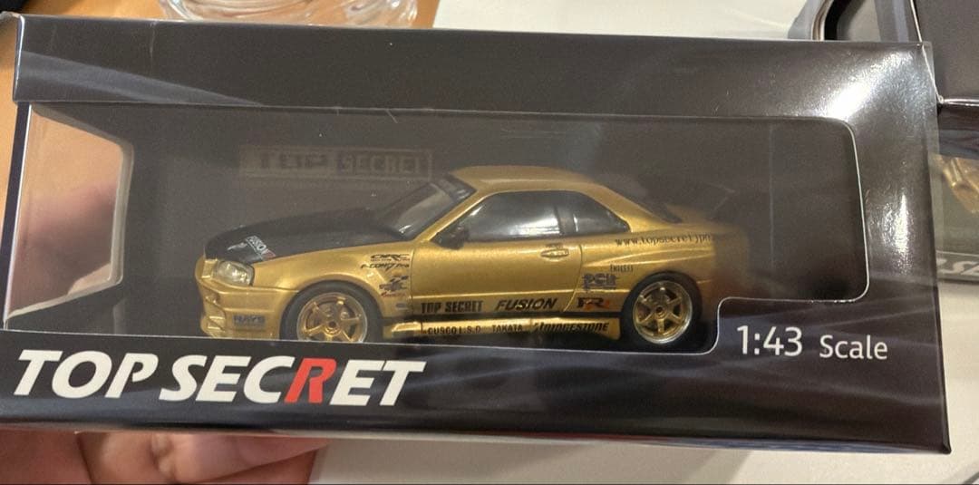 東京オートサロン202限定 「ixo TOP SECRET R34 Gold」
