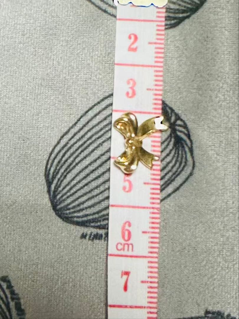 ピアス リボンピアス 18金 AU750 新品未使用