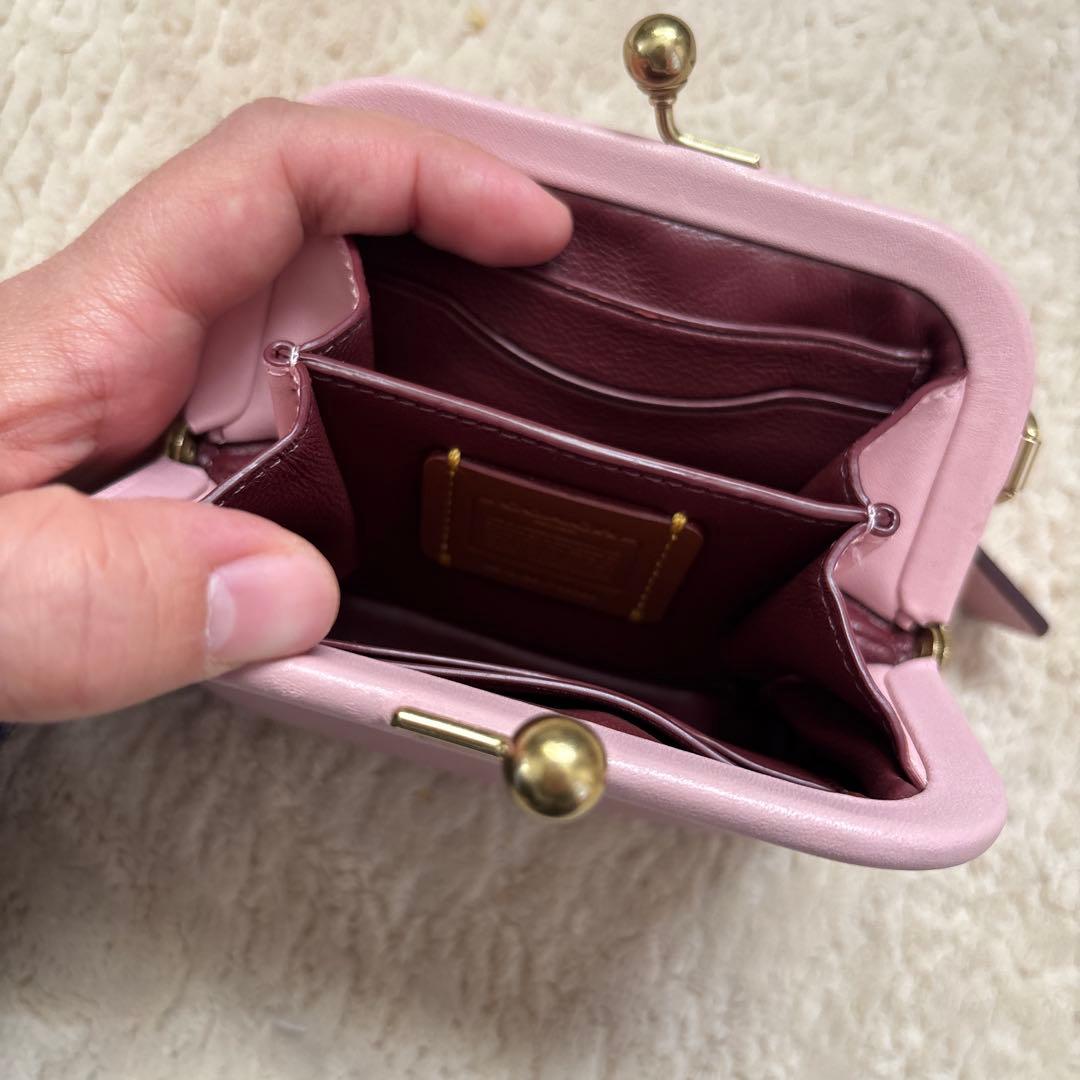 coach 薄いピンクのがま口ケース