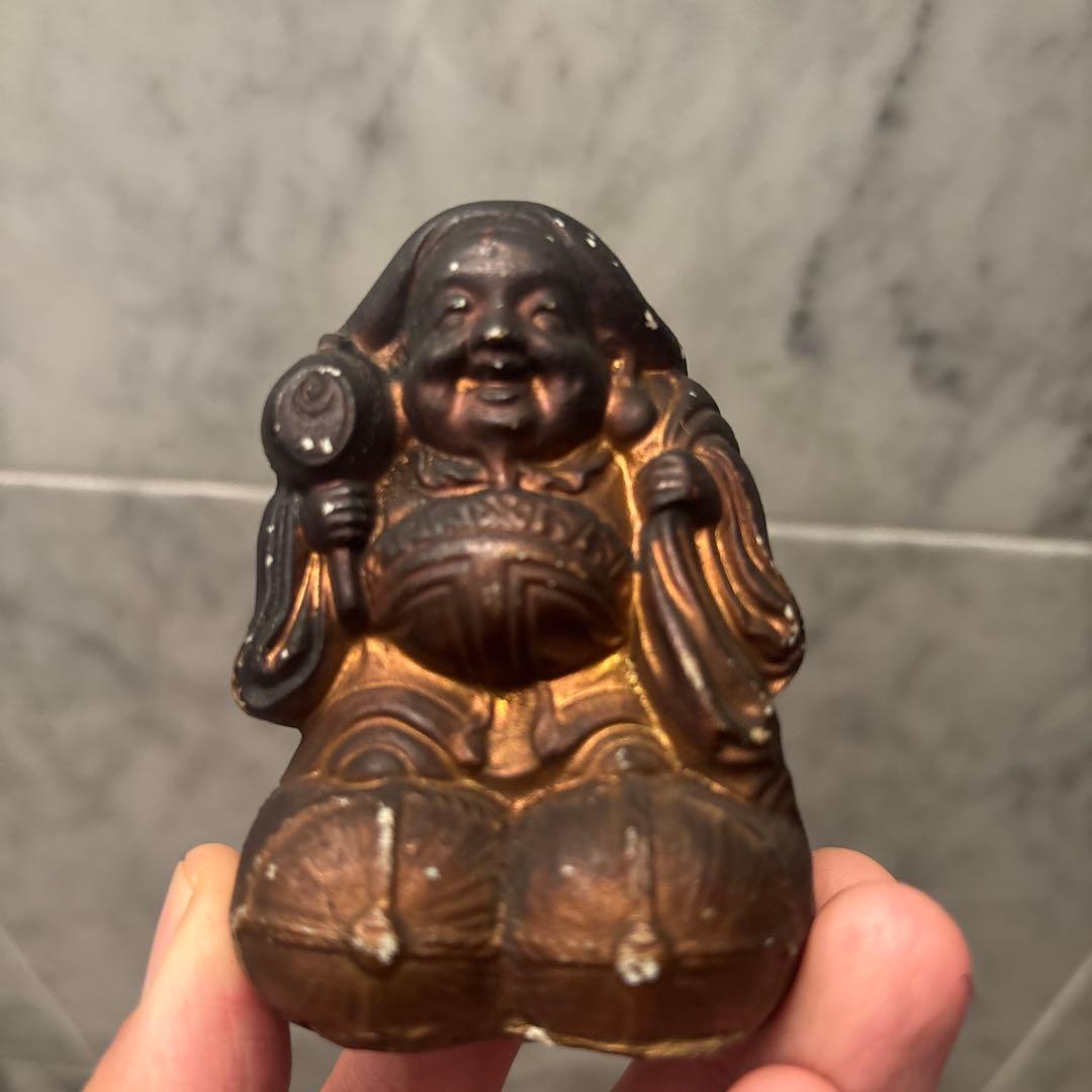 アンティーク明治時代平和的なお顔で 笑顔が素敵な大黒様の陶器オブジェ