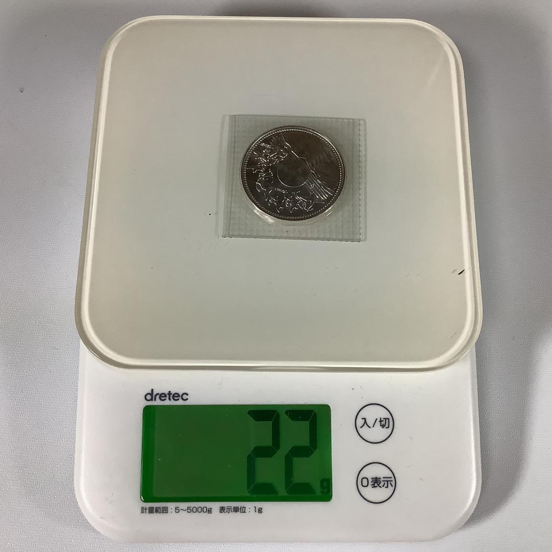 天皇陛下御在位60年記念貨幣（1万円銀貨）