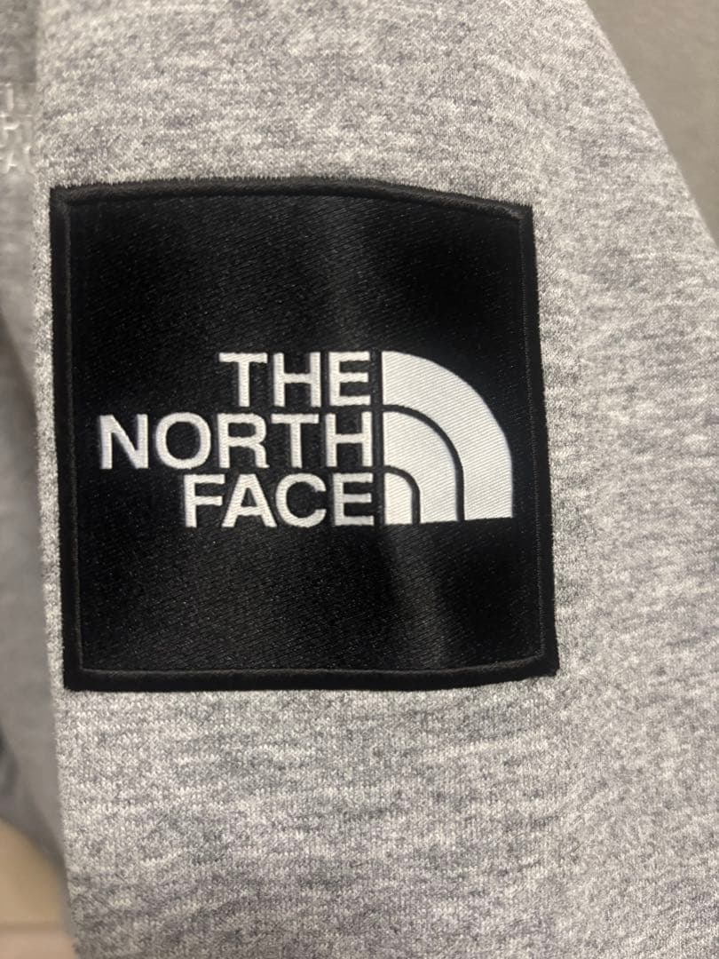 THE NORTH FACE グレー パーカー NT62338