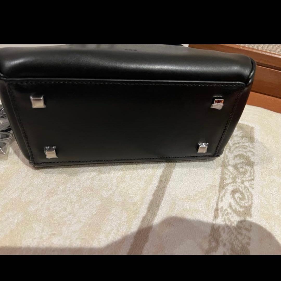 完売オルORR黒ハンドバッグmini curby bag新品ミニカーヴィーバッグ