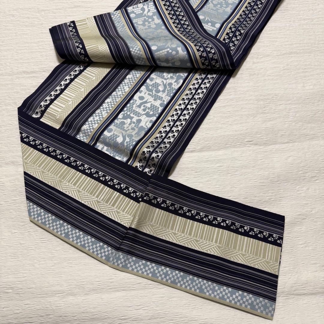 m-45 本場筑前博多織 黒木織物 猫 足跡 名古屋帯 正絹 未使用極美品