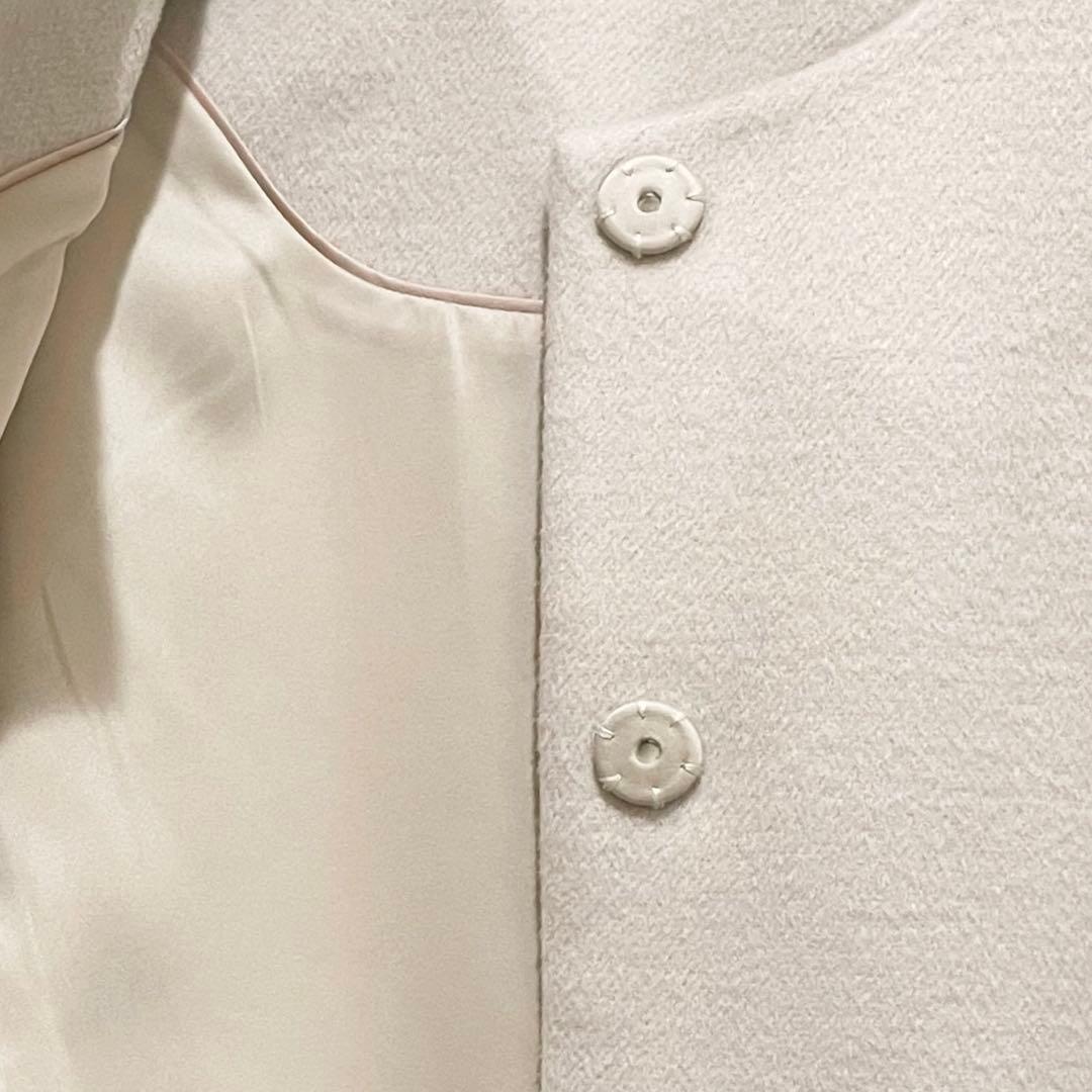 ジェンヌ エコファー襟付き ペプラム ショートコート