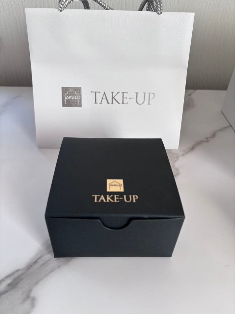 テイクアップ　ヒネリツインフープM　WG ホワイトゴールド K14/K10