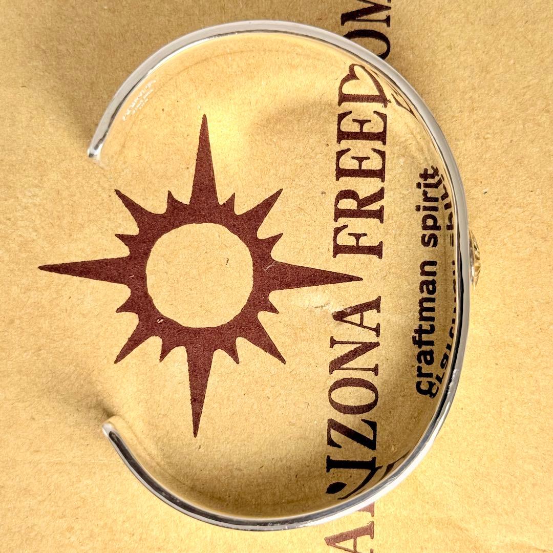 鏡面磨き Arizona Freedom ゴールド台付き太陽神唐草ブレス12mm