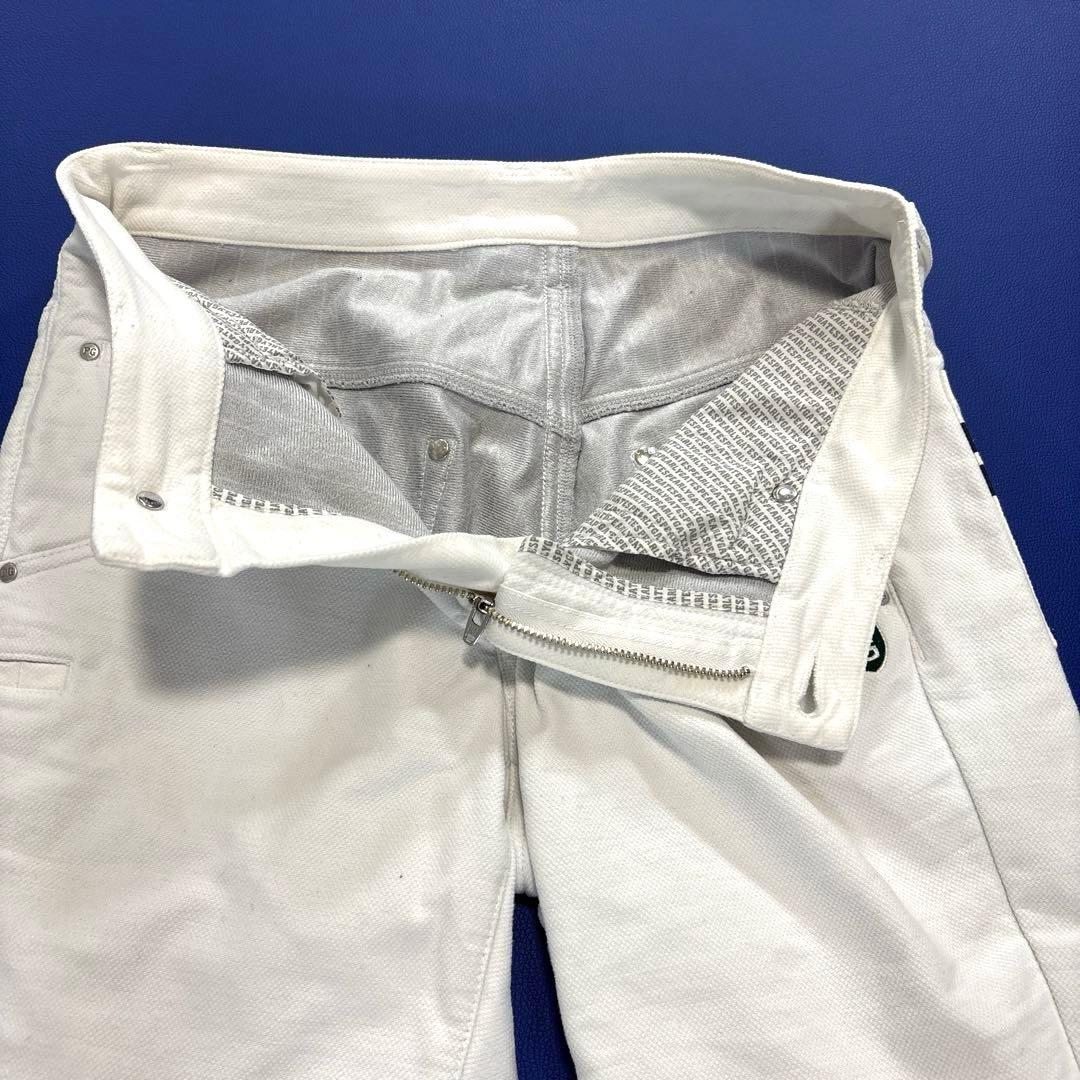 パーリーゲイツ　蓄熱　ロングパンツ　0/S ホワイト　秋冬　バックロゴ　刺繍