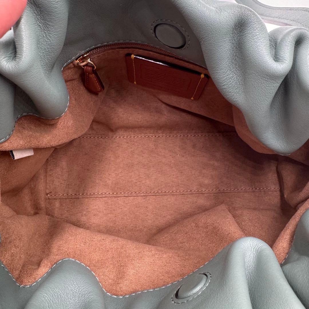 美品✨ コーチ フェイ ドローストリングバッグ レザー 巾着 ゴールド金具 水色