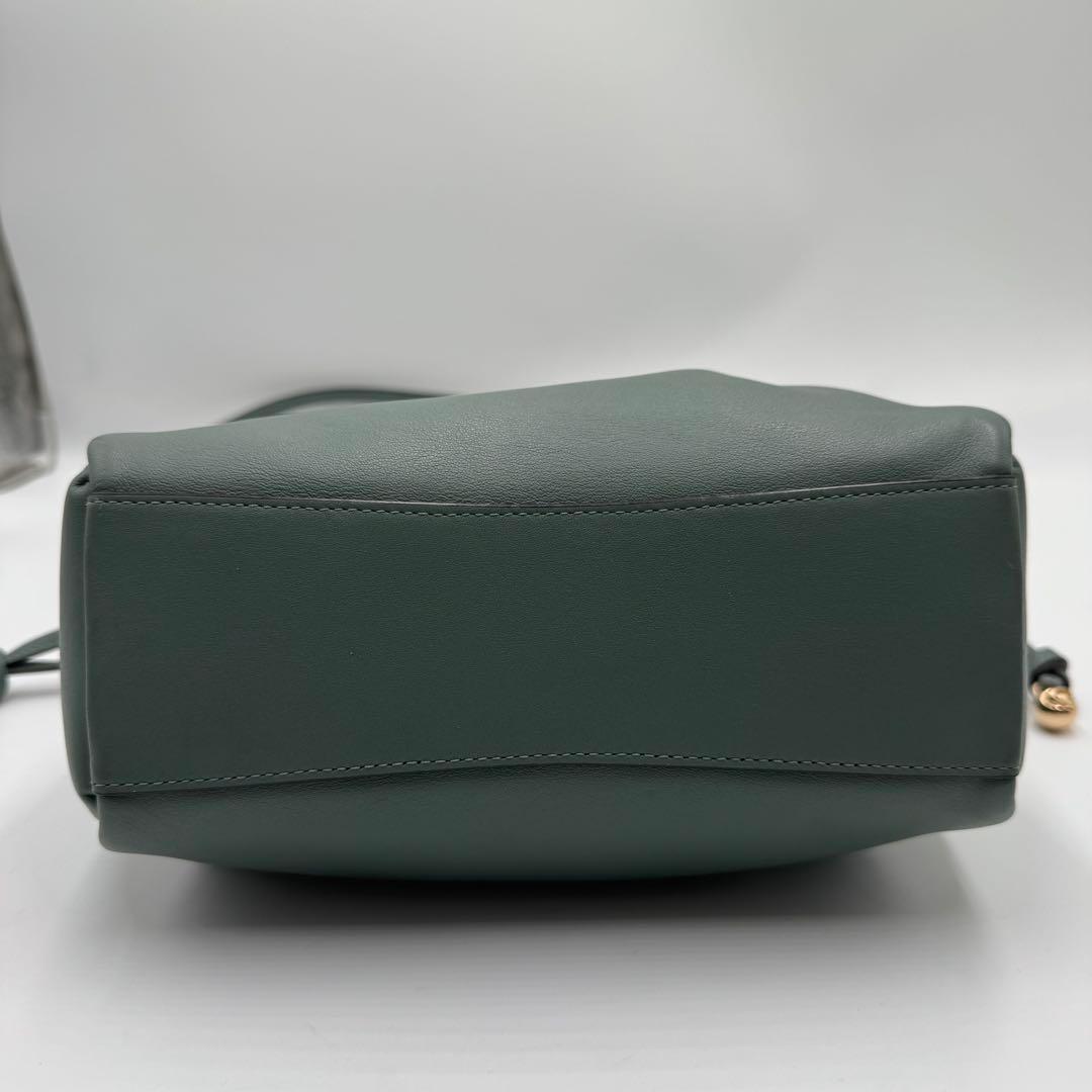 美品✨ コーチ フェイ ドローストリングバッグ レザー 巾着 ゴールド金具 水色