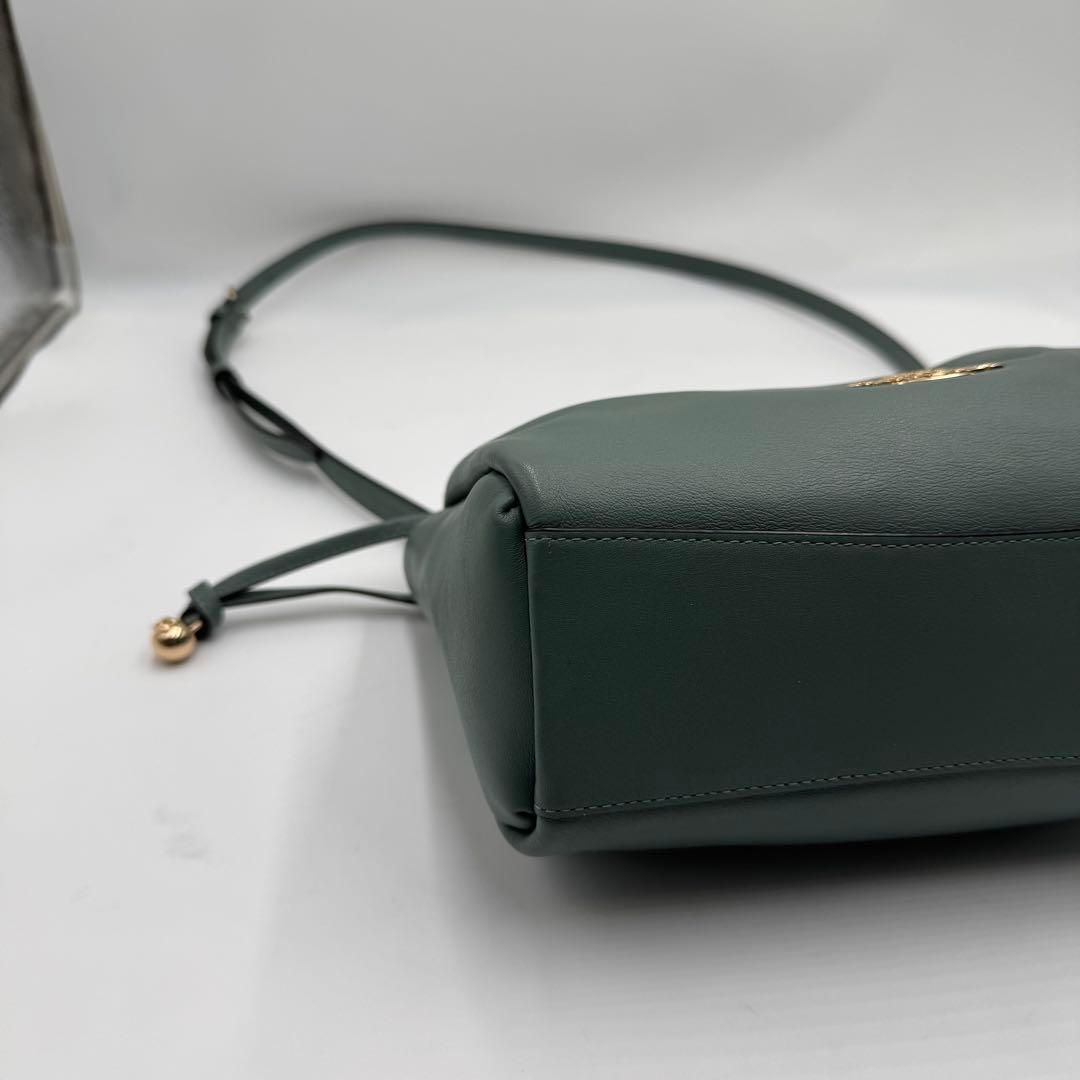 美品✨ コーチ フェイ ドローストリングバッグ レザー 巾着 ゴールド金具 水色