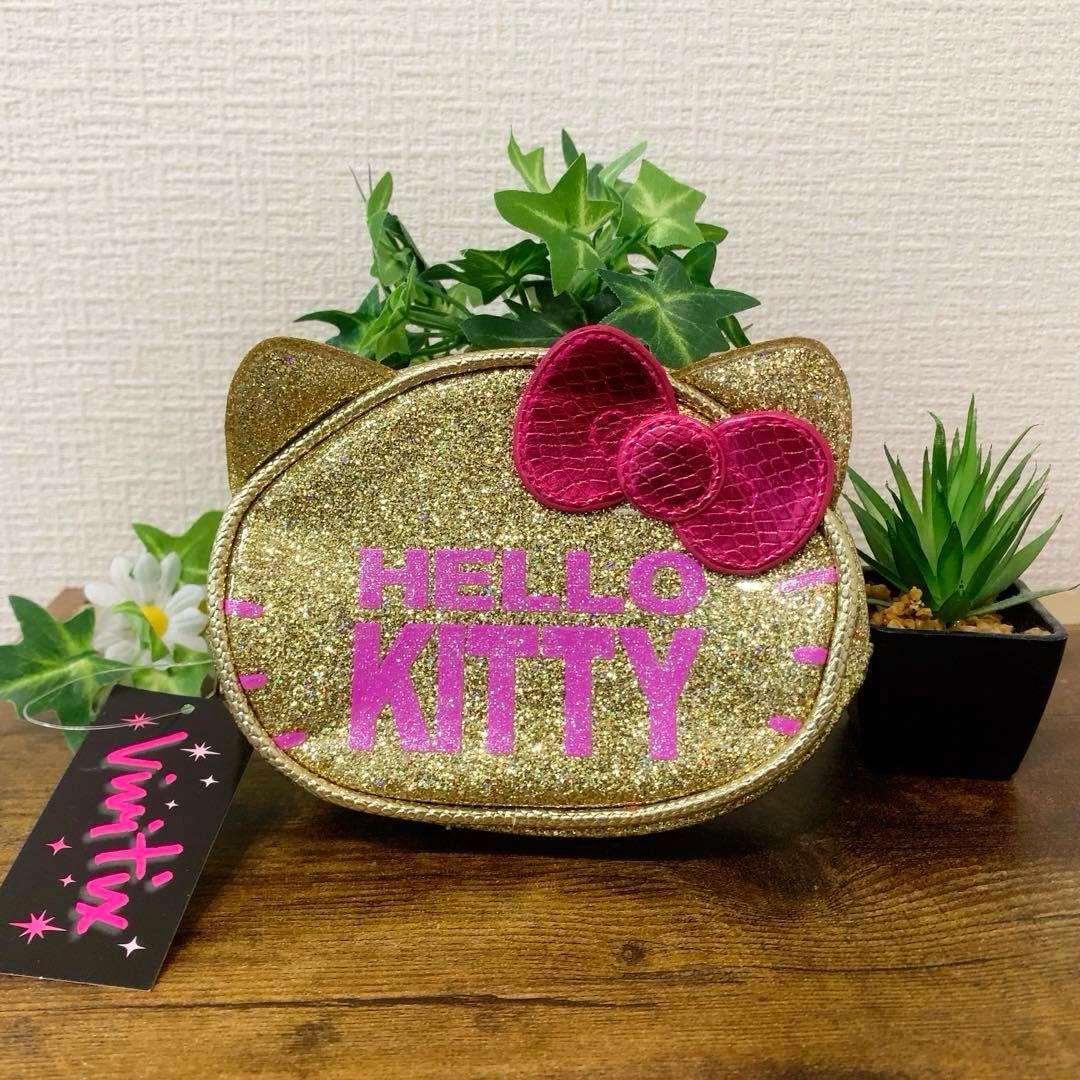 【新品未使用】ハローキティ　キラキラ　ゴールドポーチ☆Vivitix☆ タグ付き