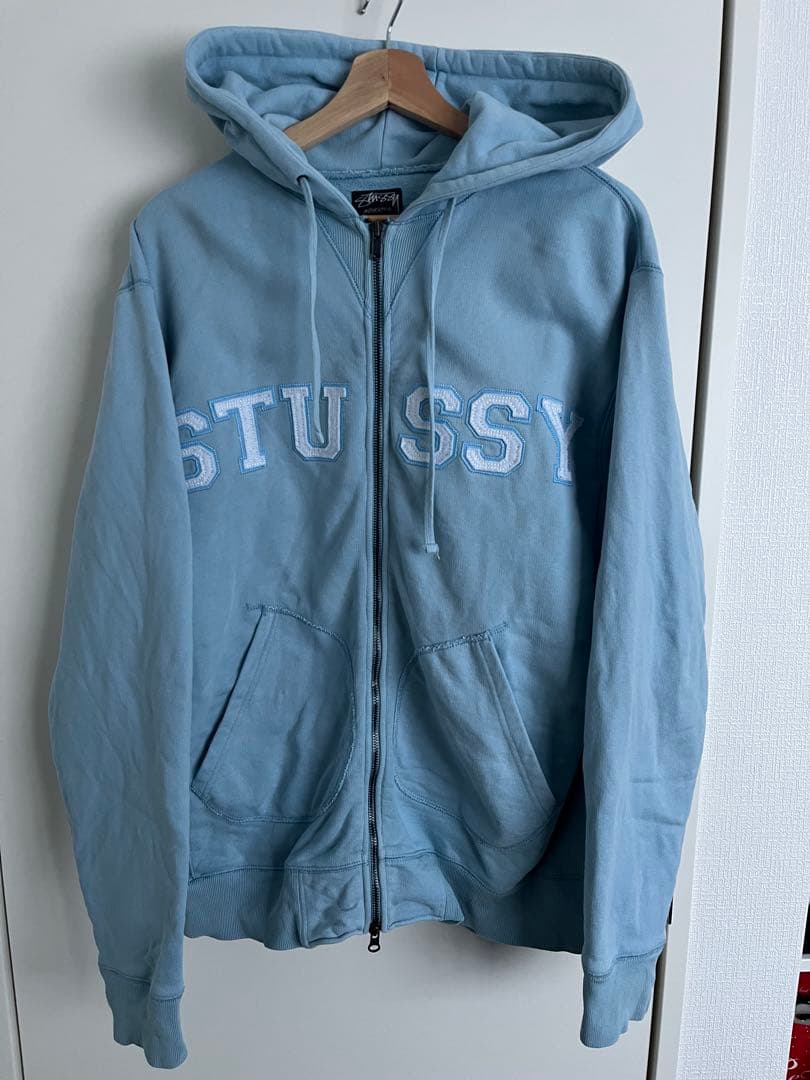 STUSSY ライトブルー ジップアップパーカー Lサイズ