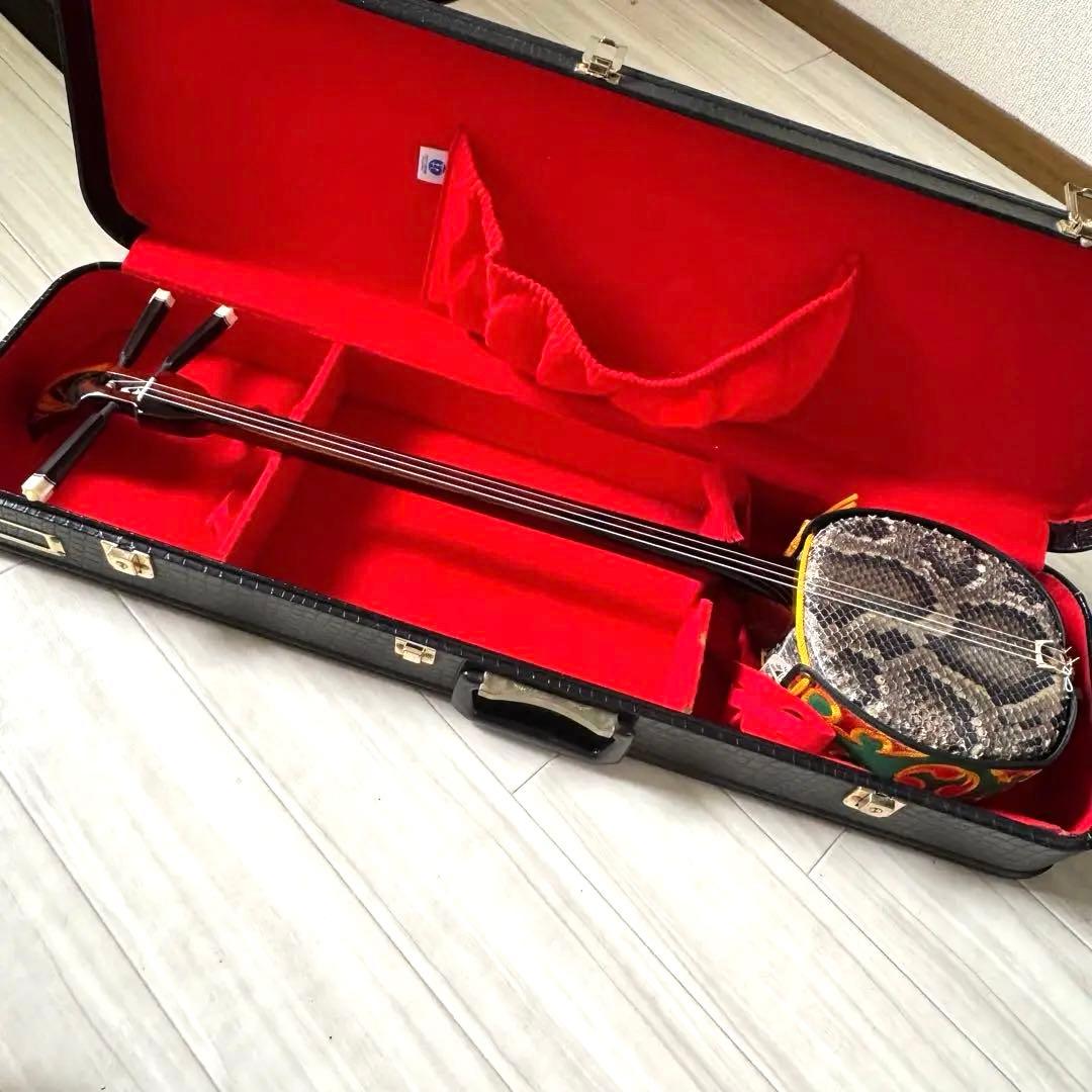 クーリー様■三線■仲嶺盛文■本皮楔(クサビ)張り■カマゴン黒檀■未使用 黒木