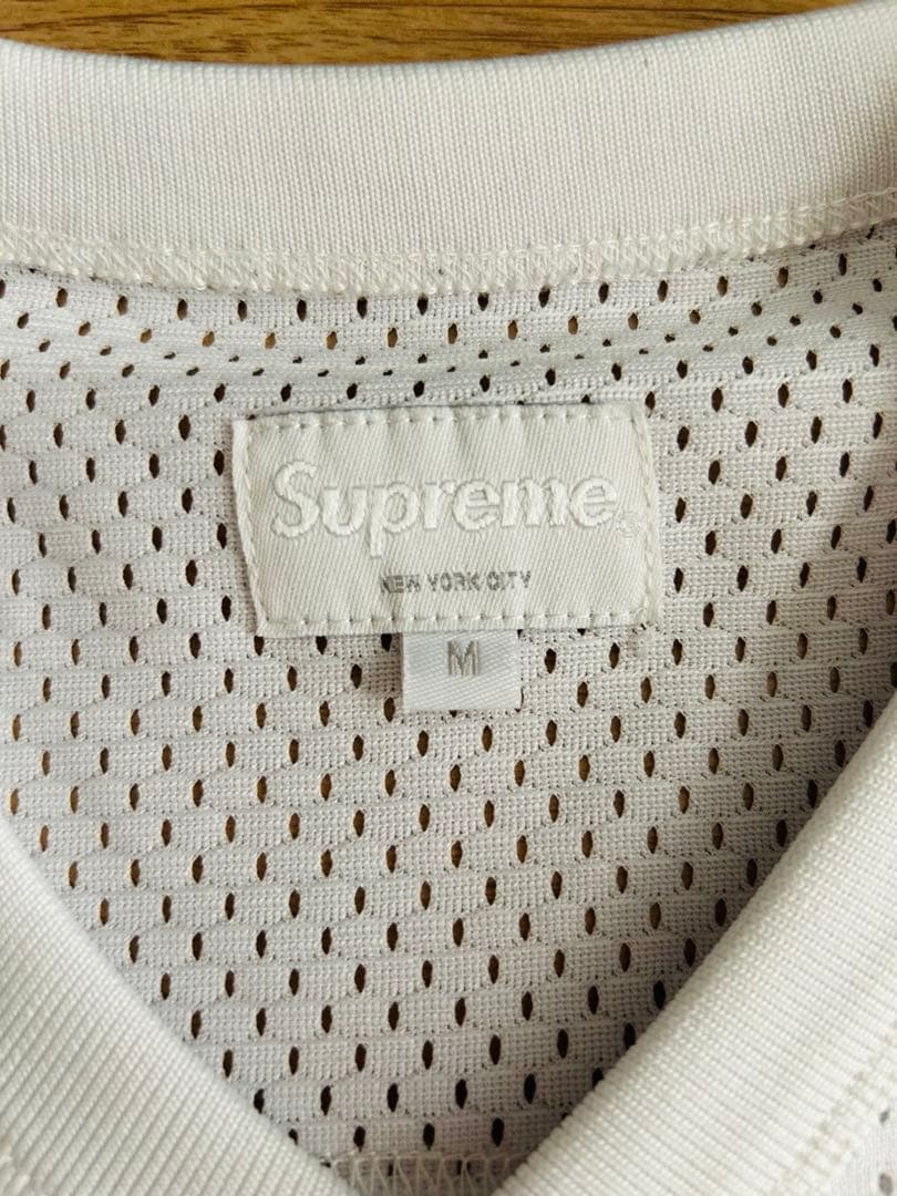 トップス supreme anti hero football