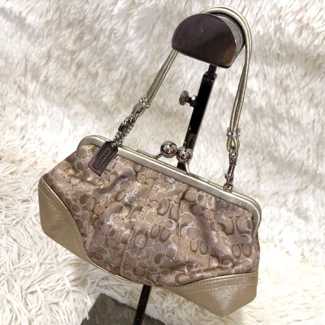 コーチ レザー ミニ ハンドバッグ シグネチャー キャンバス ガマ口