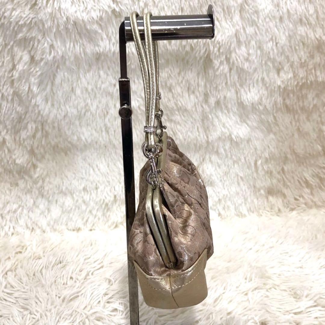 コーチ レザー ミニ ハンドバッグ シグネチャー キャンバス ガマ口