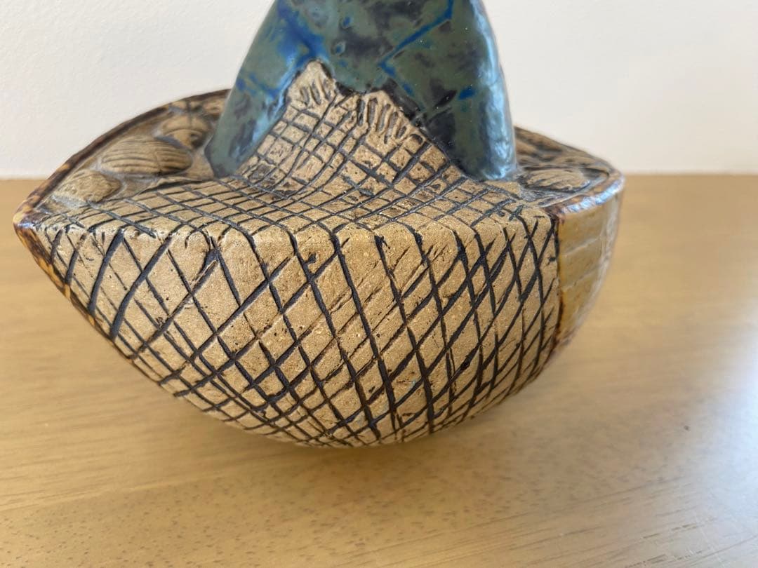 リサラーソン　漁師　Lisa Larson fisherman in boat