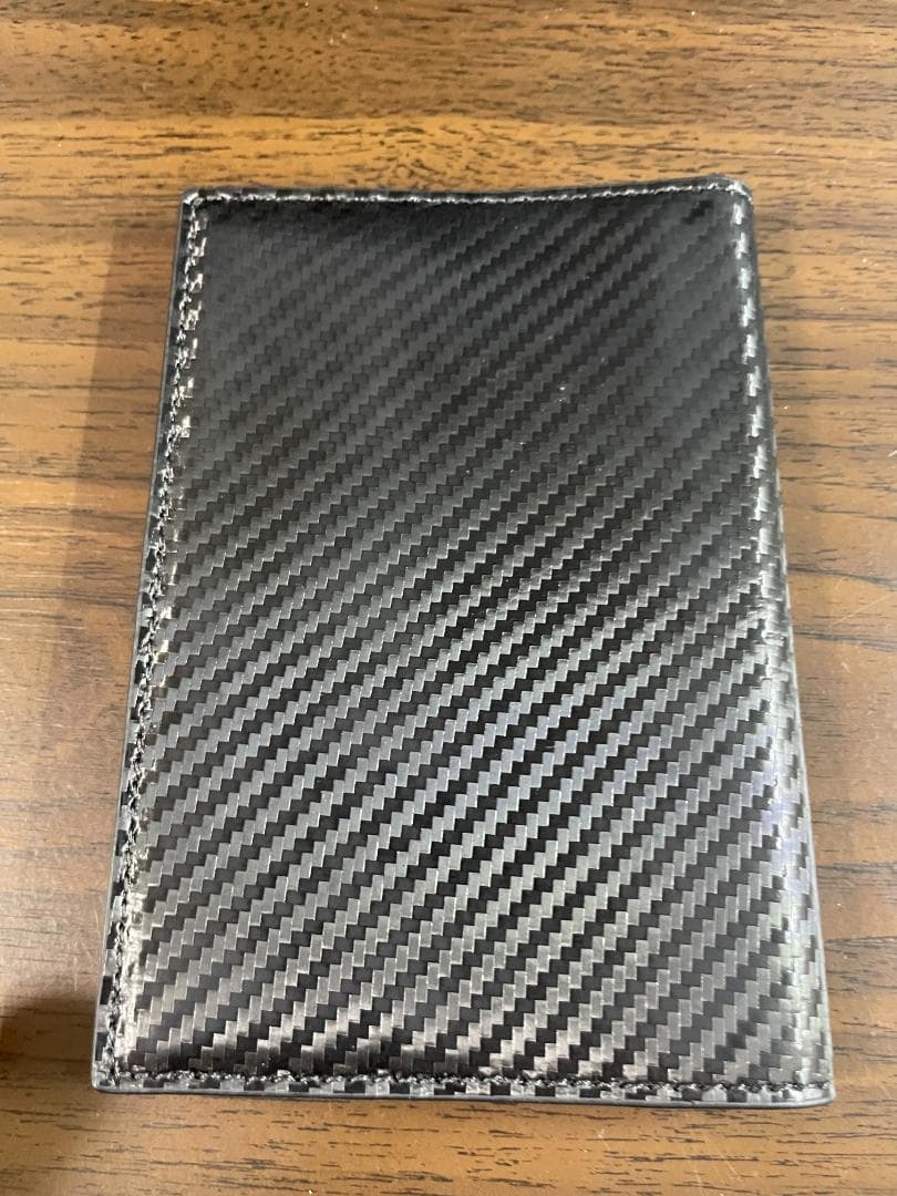 TUMI パスポートケース カーボン レザー