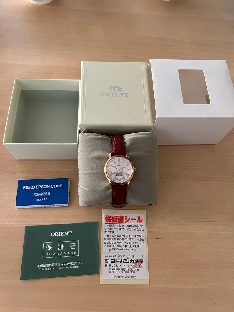 ORIENT 「太陽と月」パールダイヤル レッドレザー レディースクォーツ