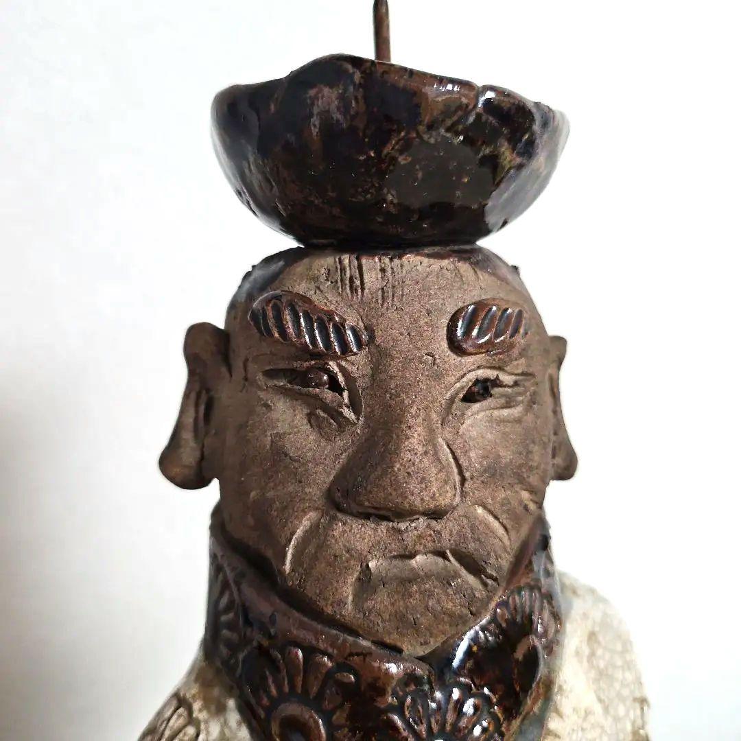 蝋燭立『鳩を抱いた伴天連』