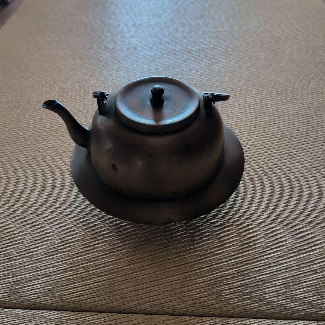 銅色丸型真鍮瓶？ 固定式取っ手付き