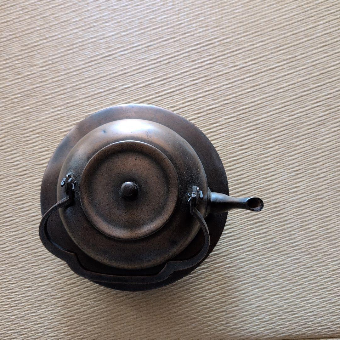 銅色丸型真鍮瓶？ 固定式取っ手付き