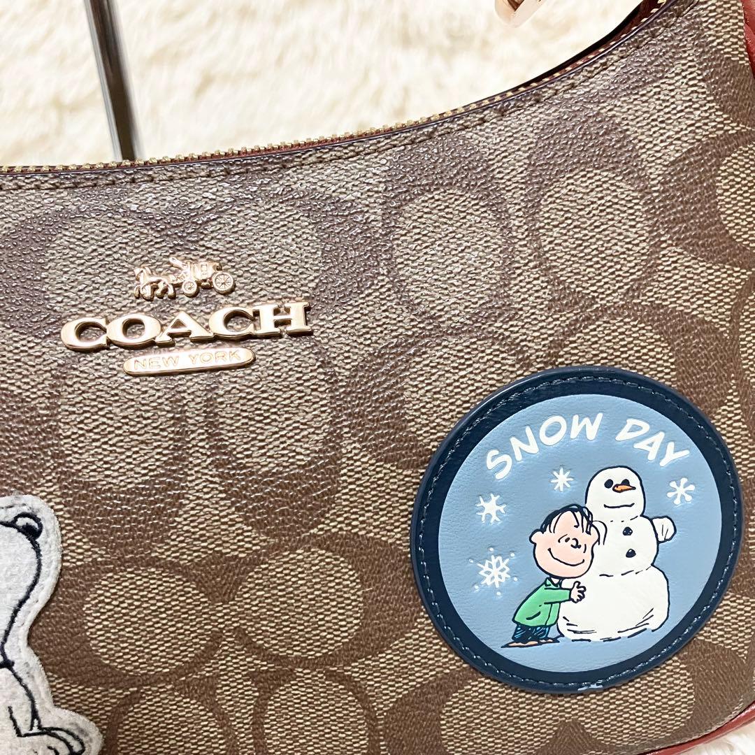【美品】COACH＊ハンド 2way アクセサリーポーチ PEANUTSコラボ