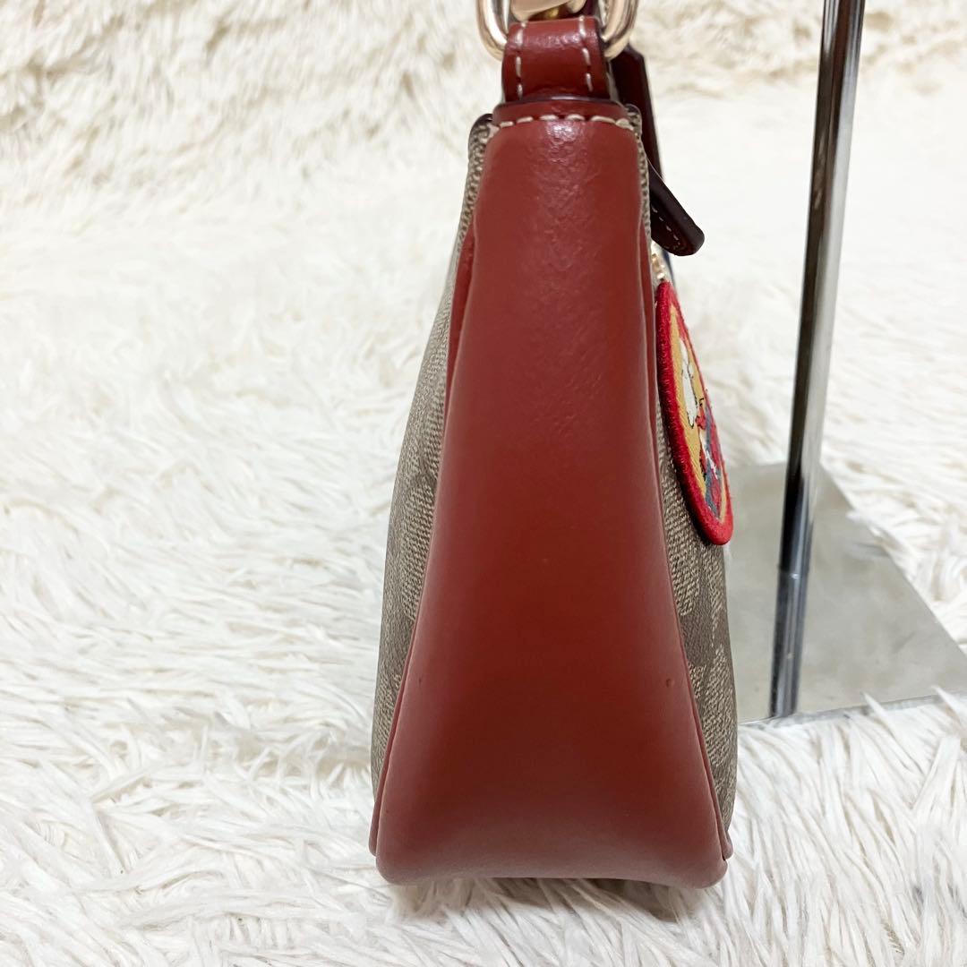 【美品】COACH＊ハンド 2way アクセサリーポーチ PEANUTSコラボ