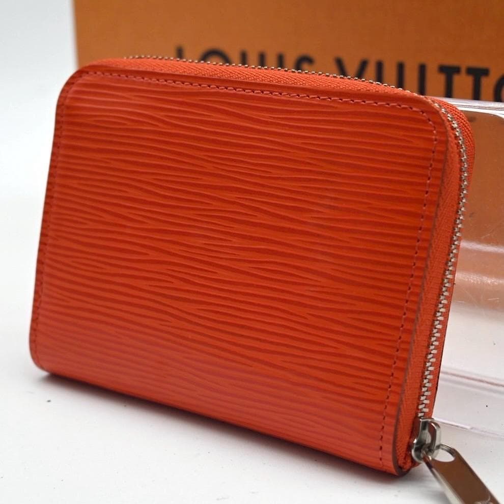 ルイヴィトン ジッピーパース エピ ピモン オレンジ ケース