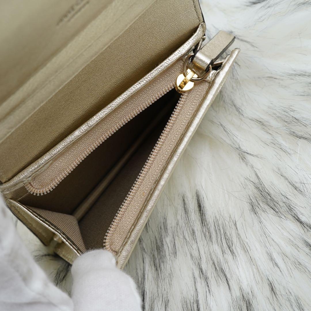 未使用品　箱・タグ類付属　jimmy choo 二つ折り財布　ゴールド系　即完売