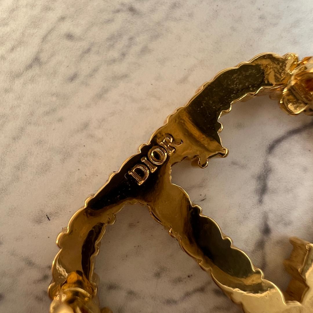 Dior ディオール　CDロゴ ストーン ブローチ ゴールド A-9220