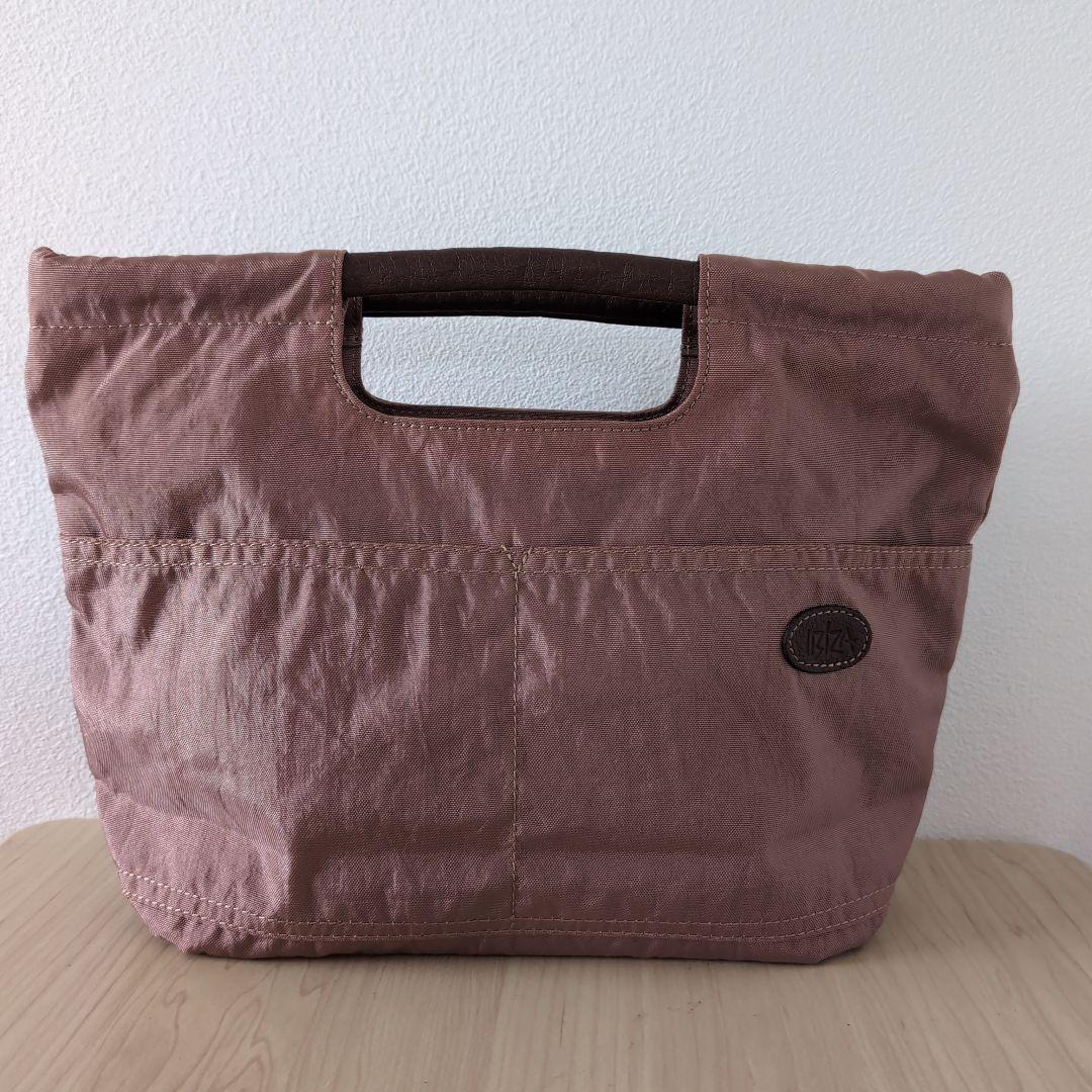 IBIZAイビザ　ナイロン×レザー手提げバッグ　薔薇モチーフ