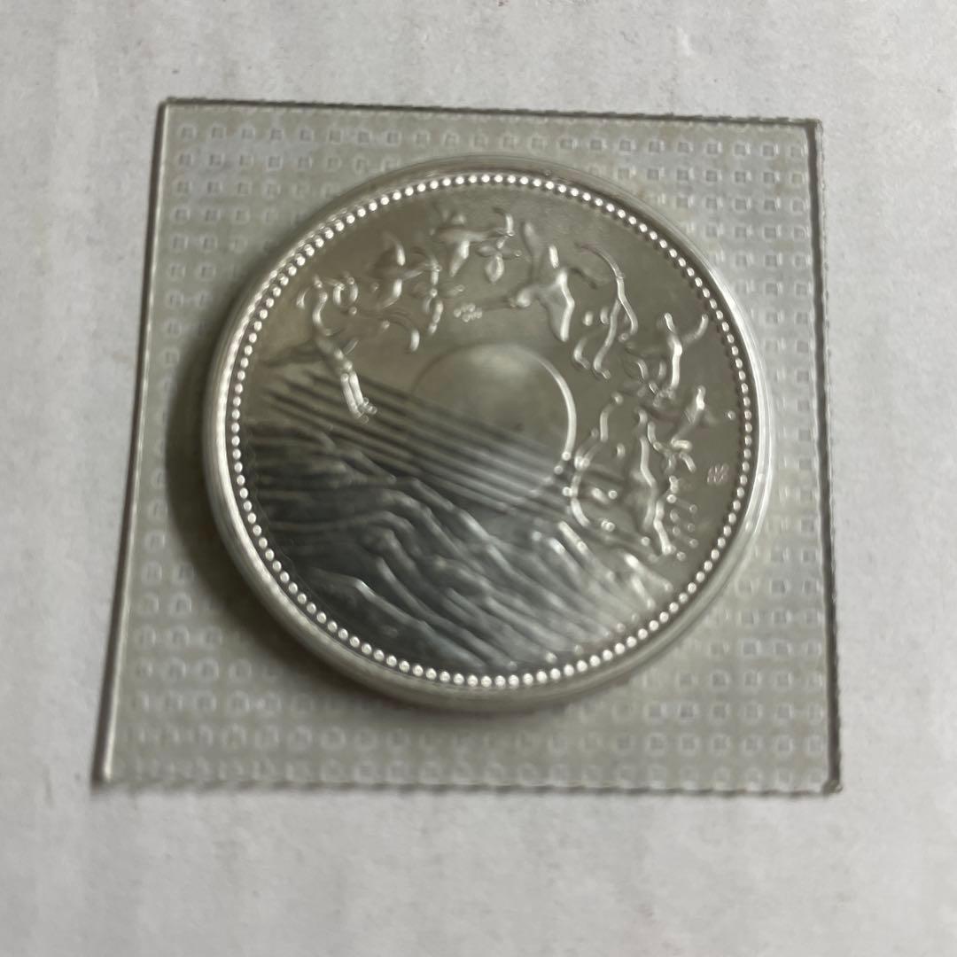 天皇在位60周年記念一万円銀貨