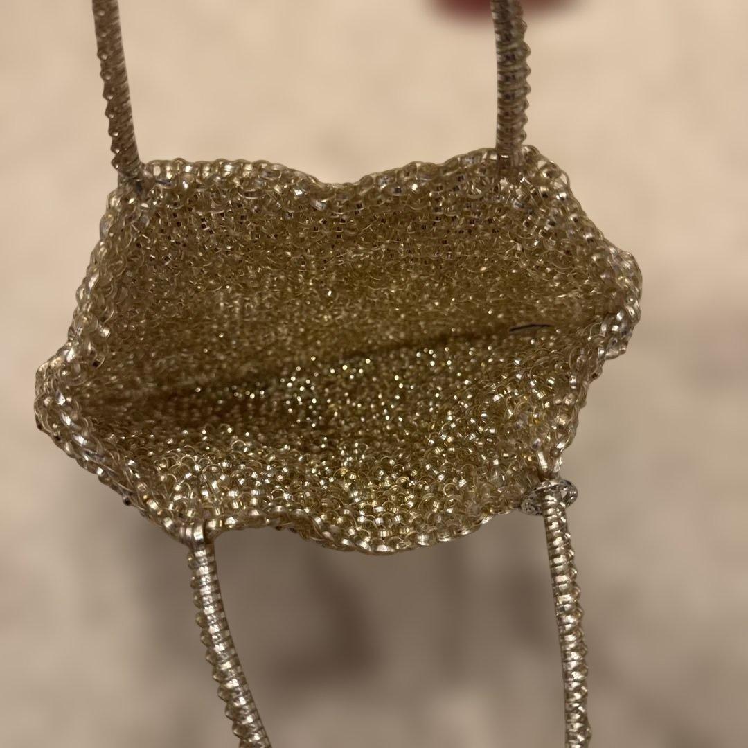 アンテプリマビジューリボンデザイン ゴールドハンドバッグ