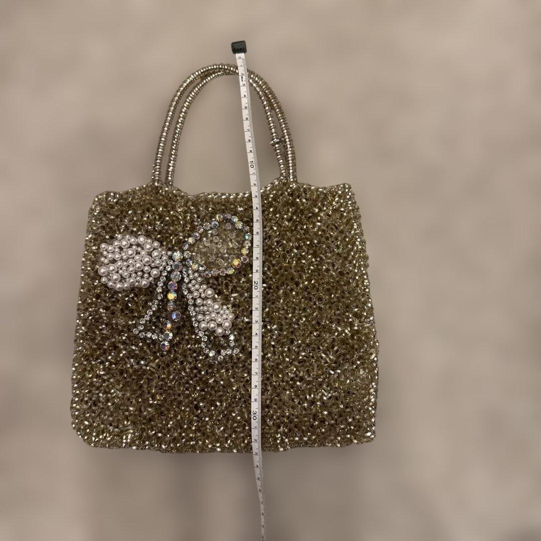 アンテプリマビジューリボンデザイン ゴールドハンドバッグ