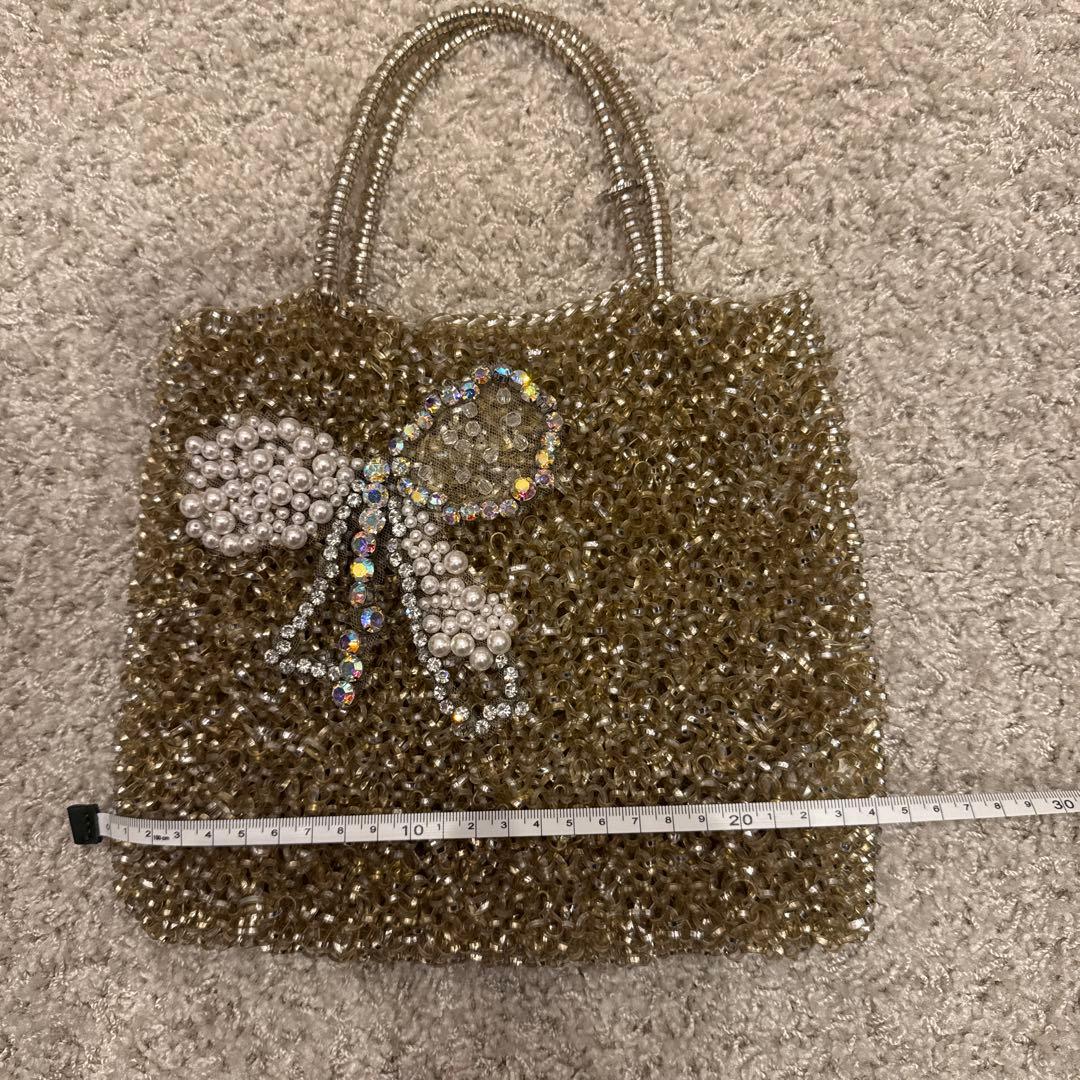 アンテプリマビジューリボンデザイン ゴールドハンドバッグ