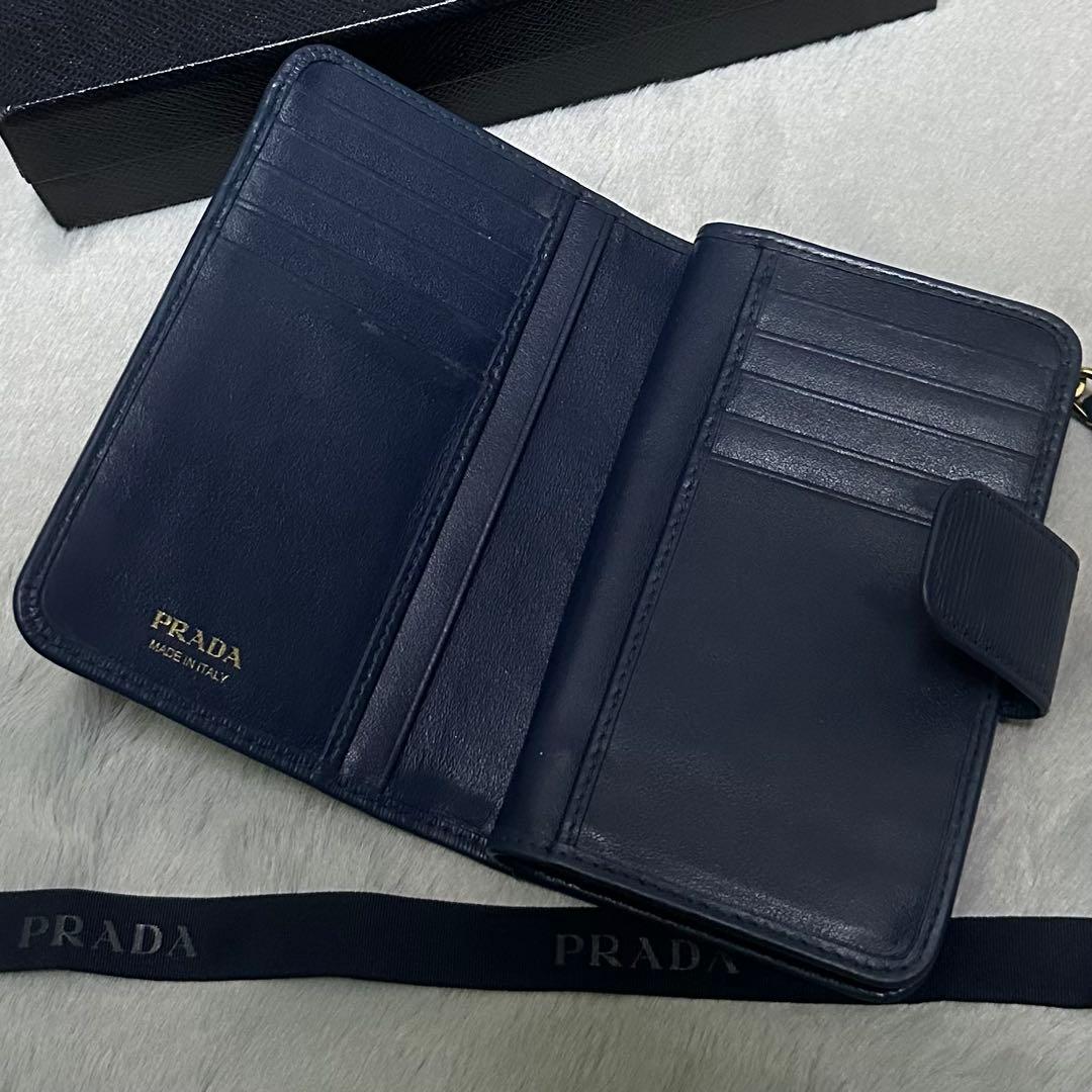 PRADA プラダ　折り財布　ラウンドファスナー　ゴールドロゴ ブルー