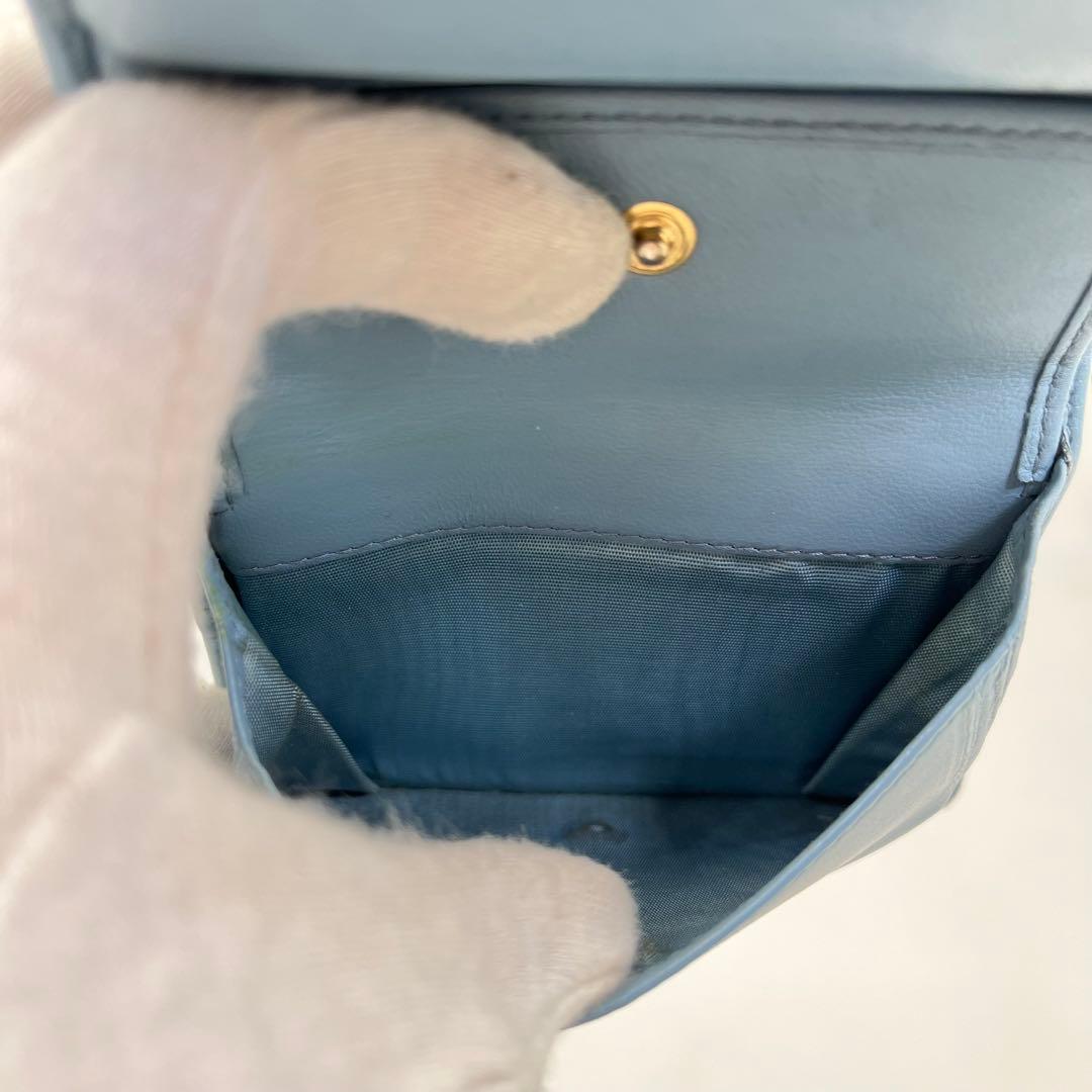 ミュウミュウ 二つ折り財布 マテラッセ クリスタル ビジュー ロゴ金具 レザー