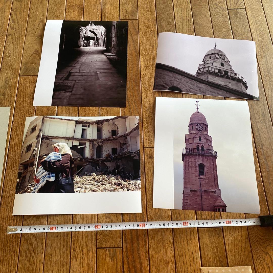 2003年　イラク戦争　逃げる婦人　写真