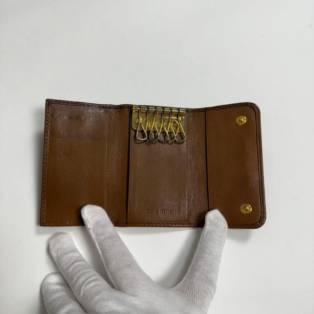 小物 MIUMIU studs leather key case