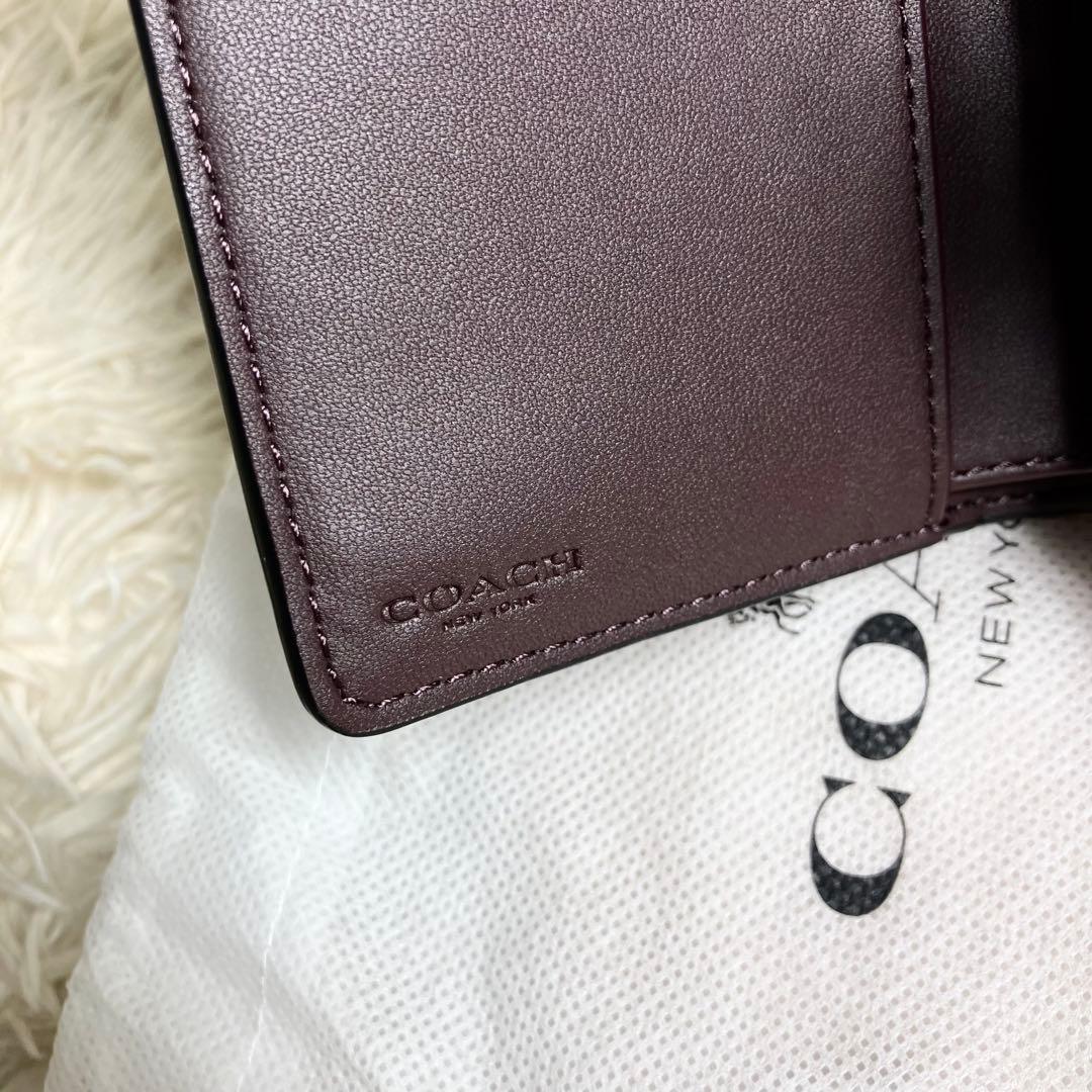 【未使用】 COACH 二つ折り シグネチャーエンボス