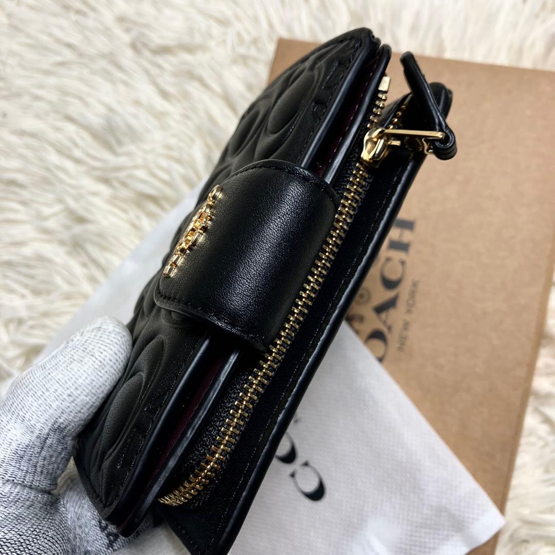 【未使用】 COACH 二つ折り シグネチャーエンボス