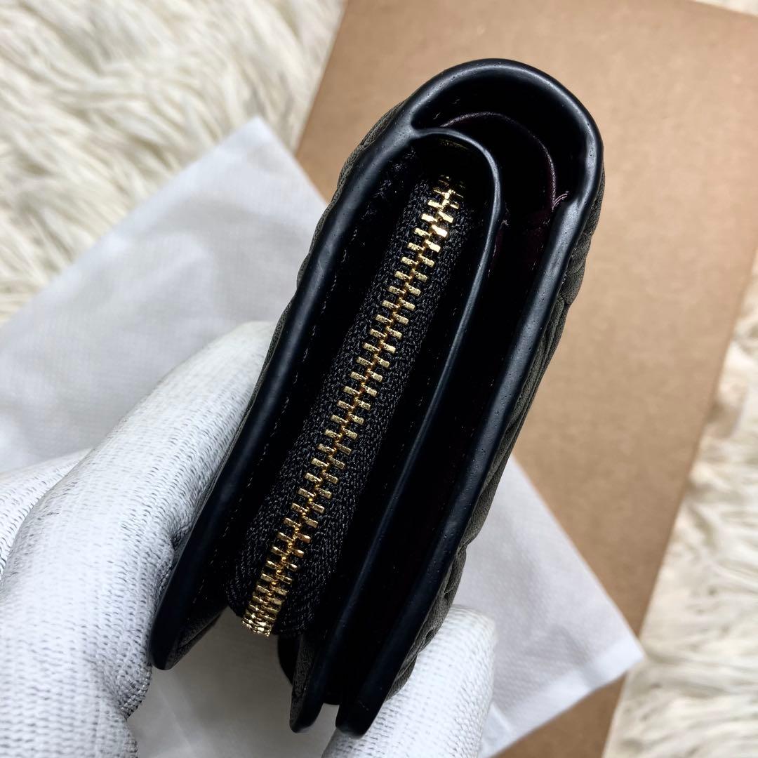 【未使用】 COACH 二つ折り シグネチャーエンボス