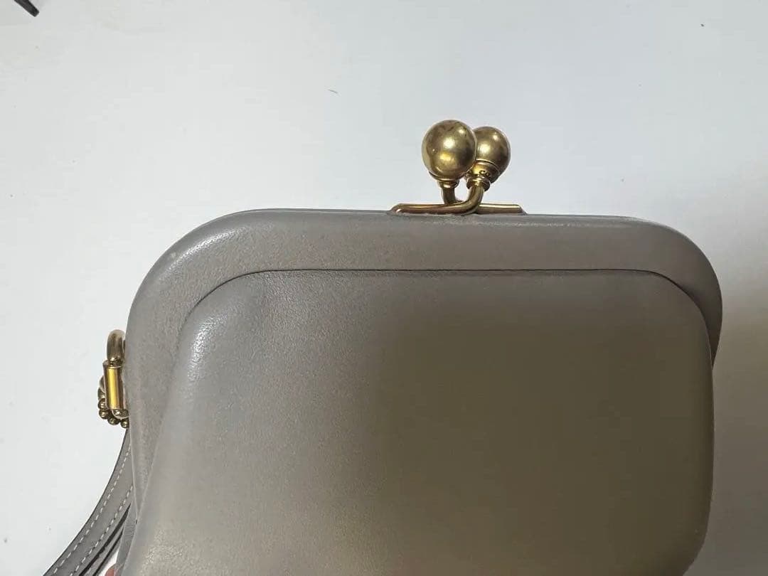 coachコーチキスロックパースがま口財布グラブタンレザー　グレー