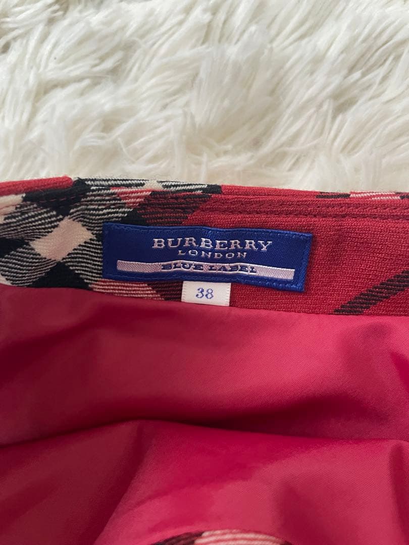バーバリーブルーレーベル赤チェックベルト付き巻きスカート