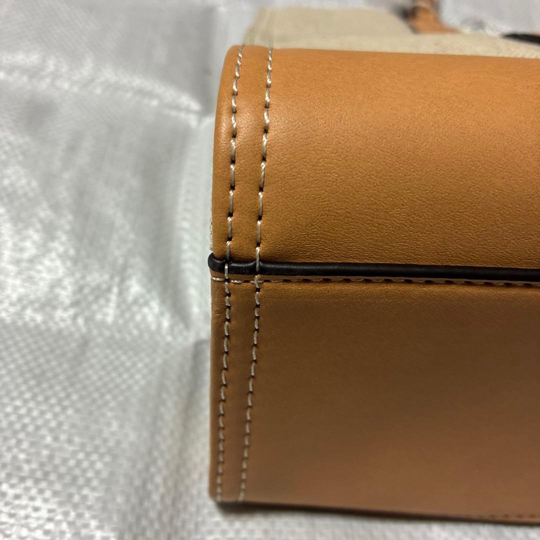 トリーバーチデカロコハンドバッグベージュ