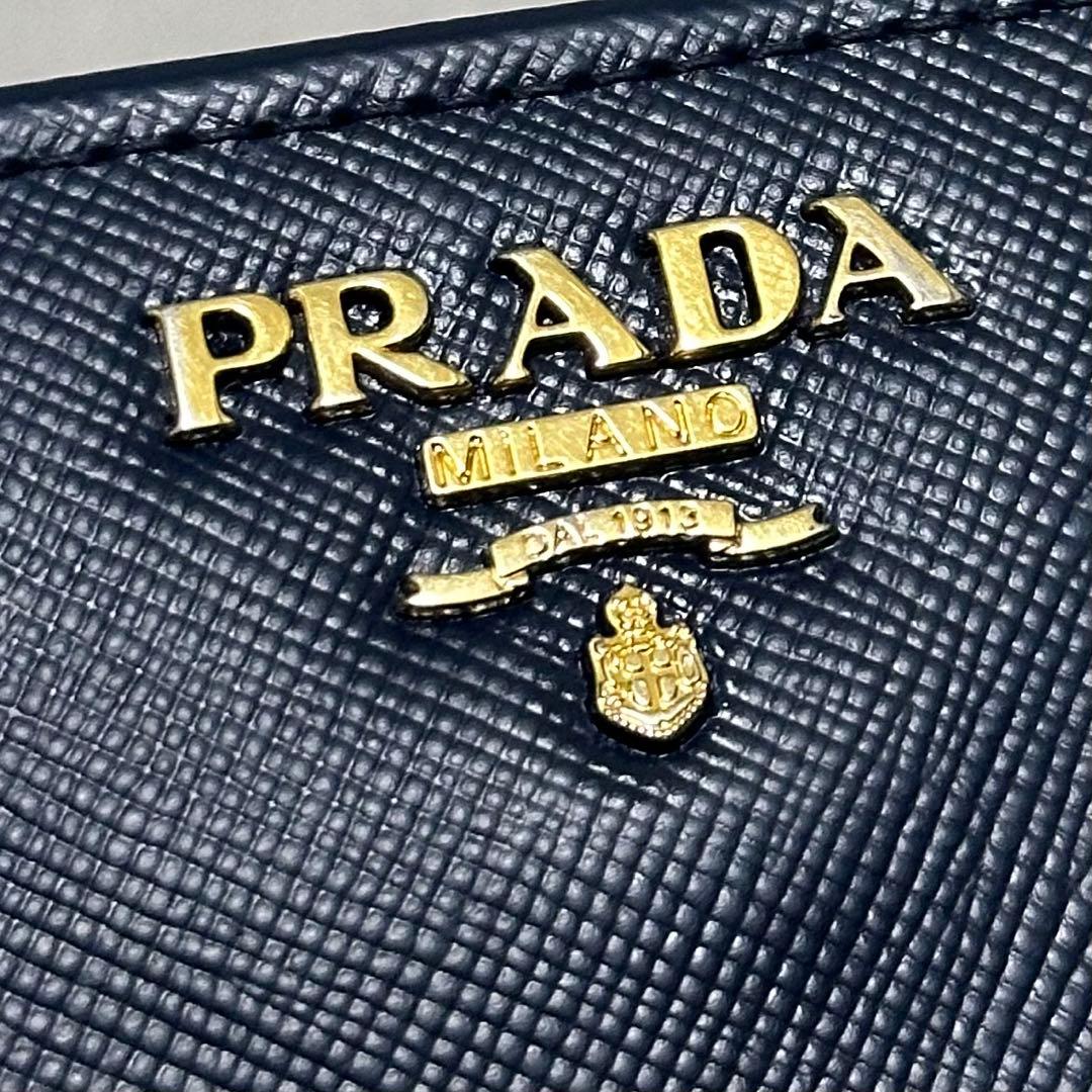 PRADA プラダ　折り財布　ラウンドファスナー　ブルー　ゴールドロゴ