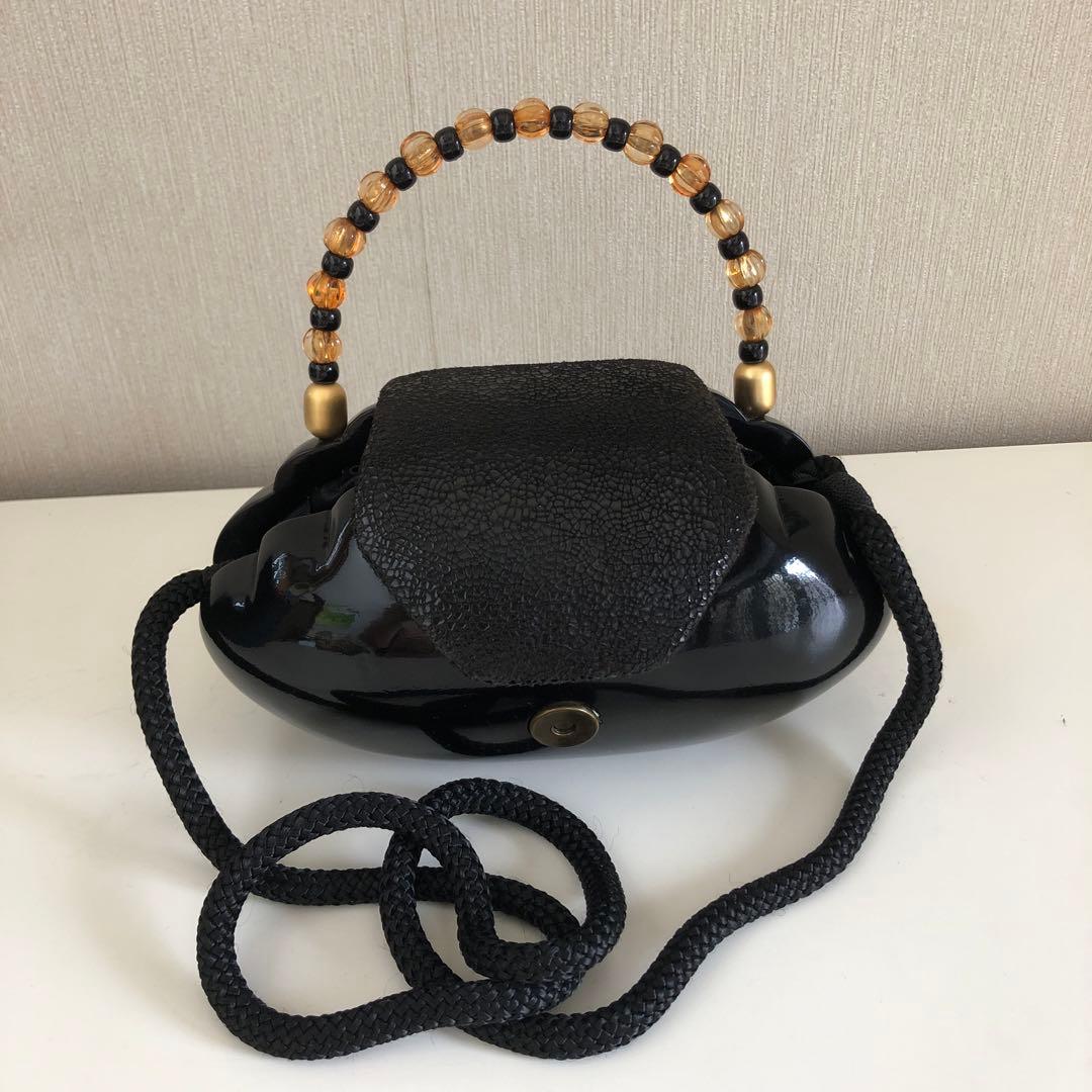 【新品未使用】〈ティミー・ウッズ〉ビーズハンドル付き・黒い木のバッグ