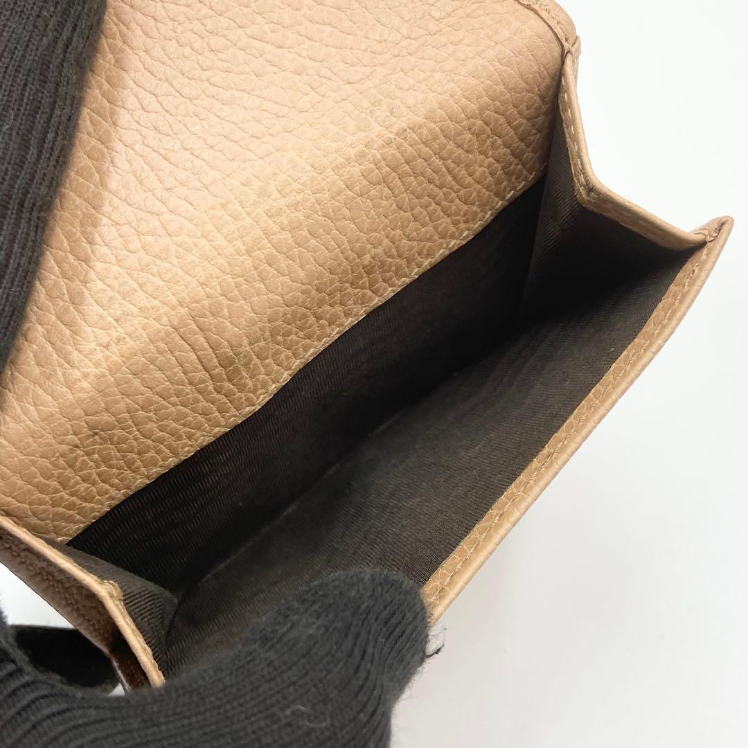 GUCCI インターロッキングG ダラーカーフ 二つ折り財布 ゴールド　ベージュ